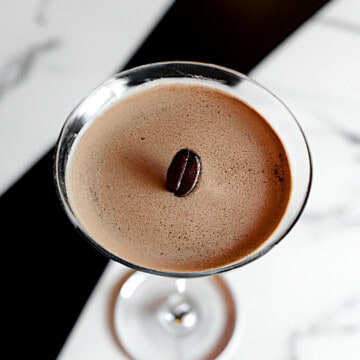 espresso vodka in a martini glass with a coffee bean